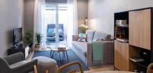TV a/nebo společenská místnost v ubytování Apartamento de diseño centrico con terraza espectacular