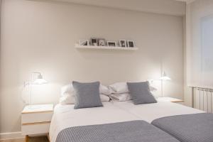 Postel nebo postele na pokoji v ubytování Apartamento de diseño centrico con terraza espectacular