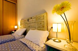 Posteľ alebo postele v izbe v ubytovaní Apartamentos Albero