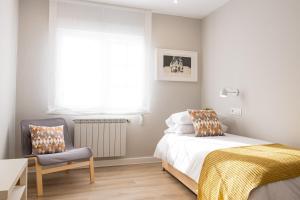 Postel nebo postele na pokoji v ubytování Apartamento de diseño centrico con terraza espectacular