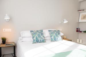 Postel nebo postele na pokoji v ubytování Apartamento de diseño centrico con terraza espectacular