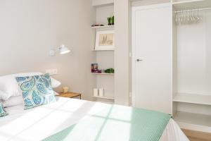 Postel nebo postele na pokoji v ubytování Apartamento de diseño centrico con terraza espectacular