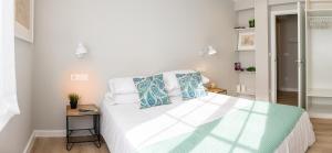 Postel nebo postele na pokoji v ubytování Apartamento de diseño centrico con terraza espectacular