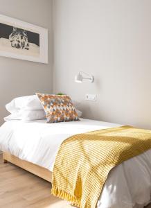 Postel nebo postele na pokoji v ubytování Apartamento de diseño centrico con terraza espectacular