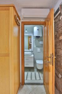 Koupelna v ubytování Apartments Villa Serventi + 37 fotografií