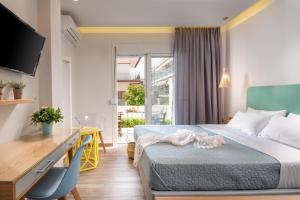 Postel nebo postele na pokoji v ubytování Kochyli Garden Studios