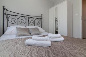 Posteľ alebo postele v izbe v ubytovaní Apartament 24 ul.Proletariacka 2A centrum