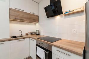 Kuchyňa alebo kuchynka v ubytovaní Apartament 24 ul.Proletariacka 2A centrum