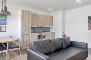 Kuchyň nebo kuchyňský kout v ubytování Stay Apartments Einholt