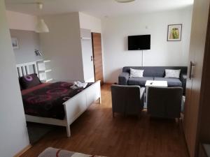 Postel nebo postele na pokoji v ubytování Penzion Panorama