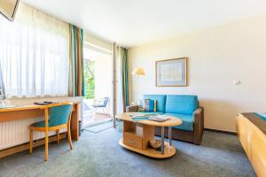 Posezení v ubytování Hotel Pension Café Hasler