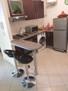 Η κουζίνα ή μικρή κουζίνα στο residence l Océon de bouznika
