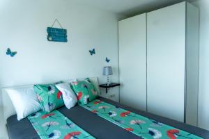 Postel nebo postele na pokoji v ubytování Apartman ZTC