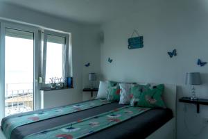 Postel nebo postele na pokoji v ubytování Apartman ZTC