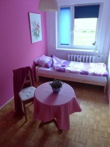Posteľ alebo postele v izbe v ubytovaní Apart