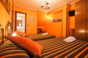 Cama o camas de una habitación en CASA RURAL BARAZAR