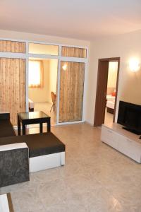 A bed or beds in a room at Aparthotel Lucky Family