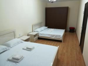 Letto o letti in una camera di West House