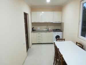 A kitchen or kitchenette at West House