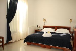 Кровать или кровати в номере Hotel Danica