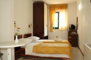 Кровать или кровати в номере Hotel Danica