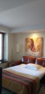 Un ou plusieurs lits dans un hébergement de l'établissement Hotel Playa Grande Suites