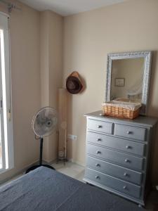 A bed or beds in a room at Ático Aretusa