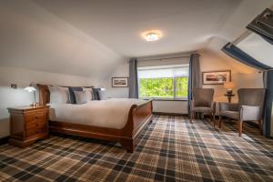 Postel nebo postele na pokoji v ubytování Edinbane Lodge