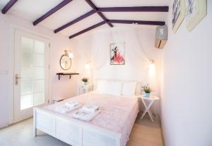 Postel nebo postele na pokoji v ubytování Masal Tatil Evi