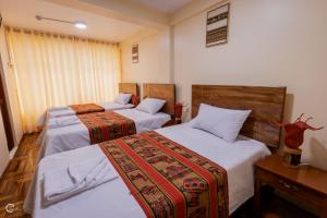 Katil atau katil-katil dalam bilik di Quechua Hostal Recoleta