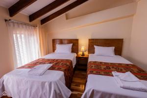 Katil atau katil-katil dalam bilik di Quechua Hostal Recoleta