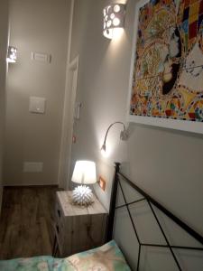 A bed or beds in a room at Case Vacanza Le Casette