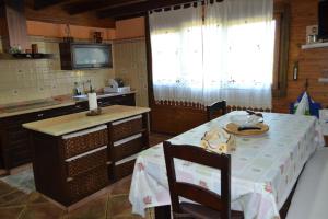 Kuchyň nebo kuchyňský kout v ubytování VILLA LAURA