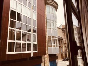 a view from the window of a building at Casa Miñor in Luarca