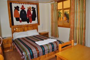 Postel nebo postele na pokoji v ubytování Hotel Santafe Inn