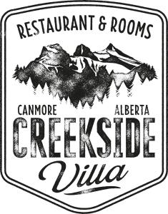 a label with a mountain range on it at Creekside Villa in Canmore