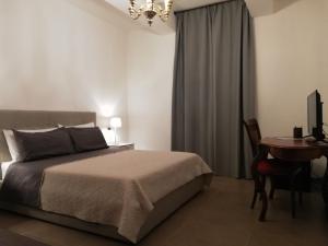 Postel nebo postele na pokoji v ubytování DreaMilan B&B