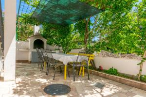Patio alebo iná vonkajšia časť ubytovania Apartments Vincic