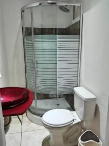 Uma casa de banho em Hotel Ciudad Blanca
