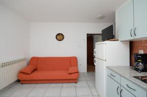 Kuchyň nebo kuchyňský kout v ubytování Apartments Slobodanka
