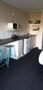 Kuchyň nebo kuchyňský kout v ubytování Mokau Motels + 17 fotografií