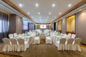 TV a/nebo společenská místnost v ubytování Shenyang Huaqiang Novlion Hotel