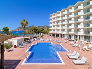 an image of a hotel with a swimming pool at Boutique Hotel H10 Blue Mar - Adults Only in Camp de Mar