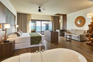 Postel nebo postele na pokoji v ubytování Riu Palace Maldivas- All Inclusive + 34 fotografií