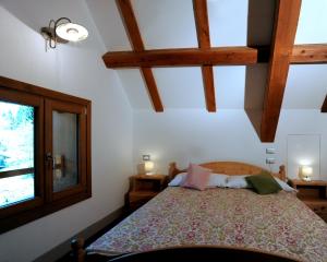 Albergo Diffuso Ravasclettoにあるベッド