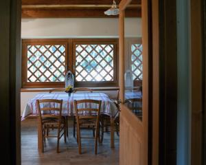Albergo Diffuso Ravasclettoにあるレストランまたは飲食店