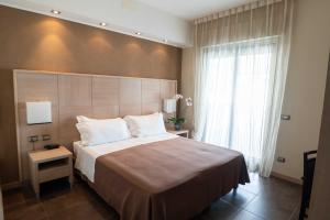 Letto o letti in una camera di Hotel Abruzzo Marina