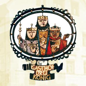 a sign with three kings on a window at Hotel Drei König in Immenstadt im Allgäu
