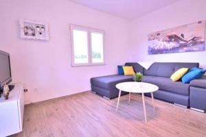 Et opholdsområde på Holiday home Dinko