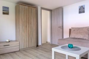 Postel nebo postele na pokoji v ubytování Jovich Apartments 2